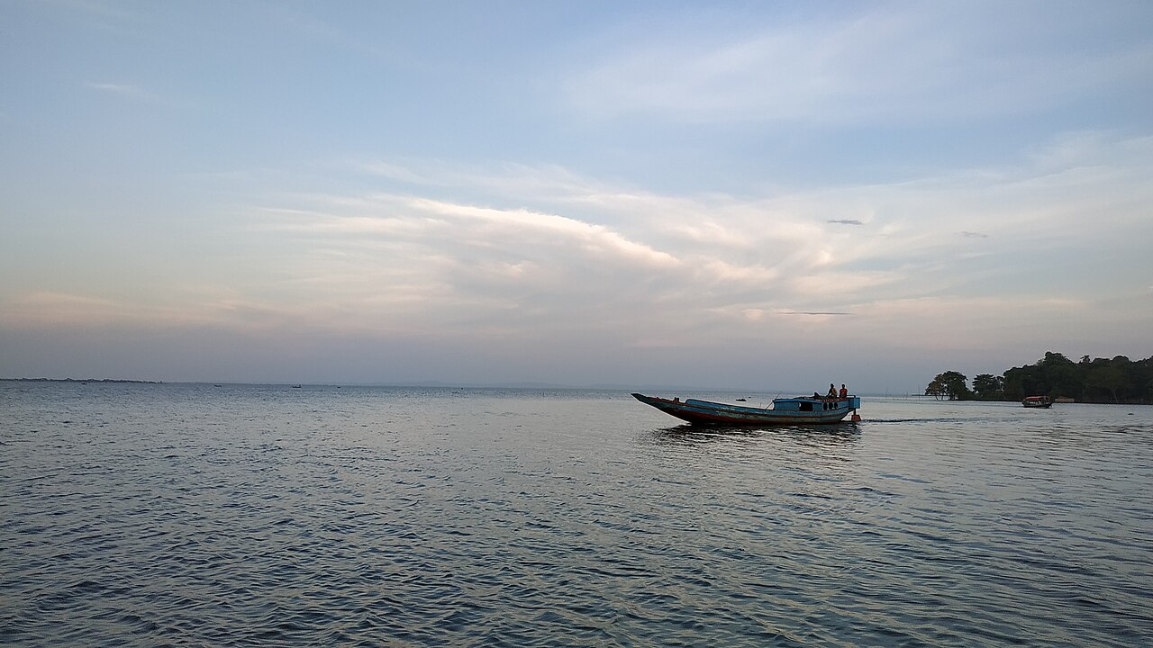Boat at dusk on Hakaluki Haor, Sylhet, Bangladesh